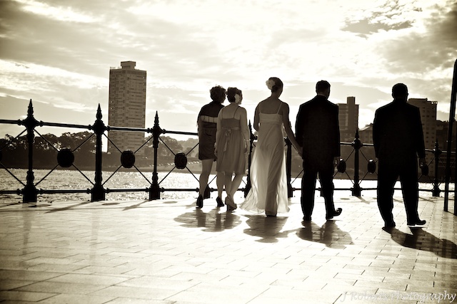 Bridal Party walk into sunset - wedding photography